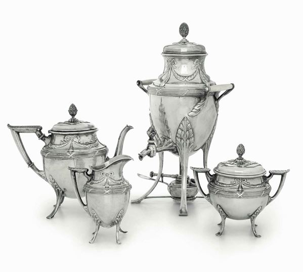 Servizio da tè. Argento fuso, sagomato e cesellato. Germania XIX-XX secolo