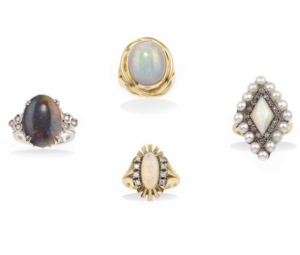 Four opal gold and silver rings