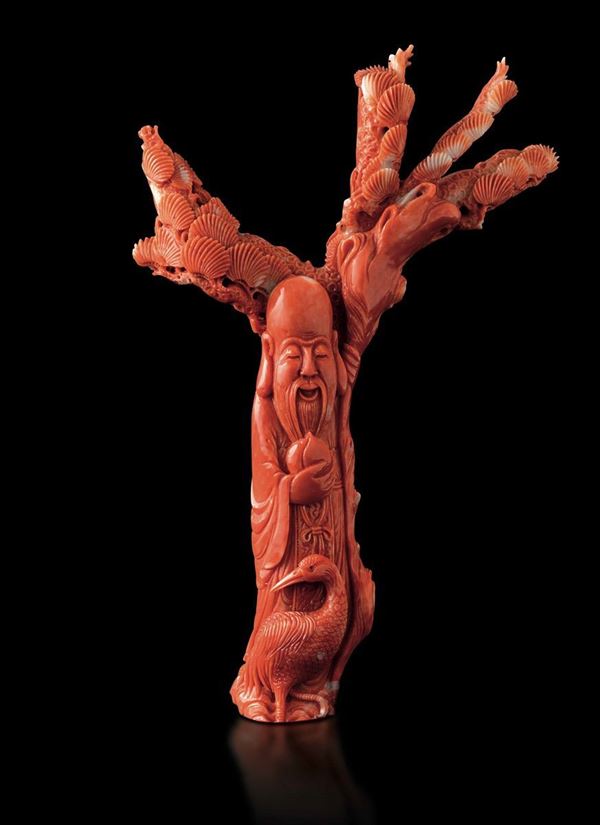 A carved coral wiseman, China, early 1900s
