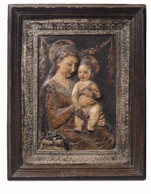 Madonna con Bambino. Rilievo in stucco policromo. Nei modi di Antonio Rossellino. Toscana, possibile XV-XVI secolo