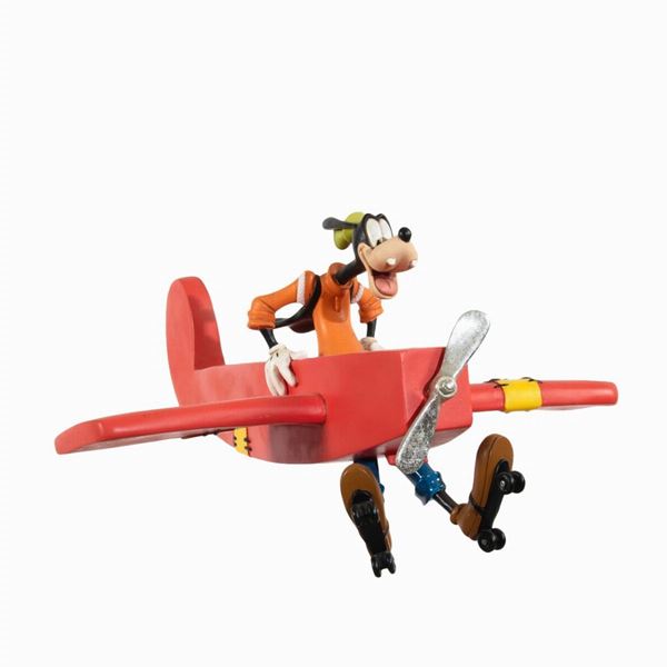 Disney: Statua Pippo con i pattini in aereo