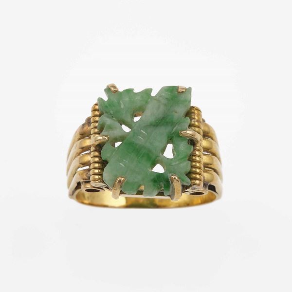 Carved jade and gold ring