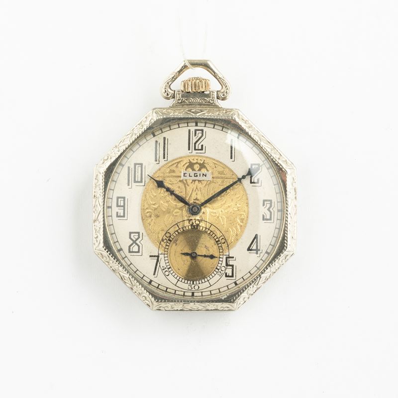 ELGIN,1930 circa, cassa ottagonale in oro bianco a 14 Kt, meccanica n. 29180434,17 rubini,  bilanciere compensato, spirale Breguet, quadrante bicolore concon numeri arabi e lancette a lancia,  difetti, mm 43, peso gr. 59 (sul retro della cassa cartiglio inciso a mano con le iniziali del proprietario "GV")  - Auction Pocket Watches - Cambi Casa d'Aste