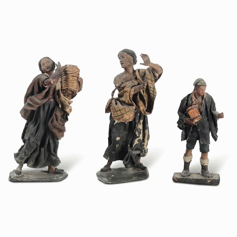 Tre figure da presepe in cartapesta raffiguranti mercanti. XIX-XX secolo  - Asta Dimore Italiane - Cambi Casa d'Aste