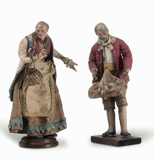 Due figure da presepe. Venditore con cesto e figura di anziana. Napoli, fine XVIII - inizio XIX secolo