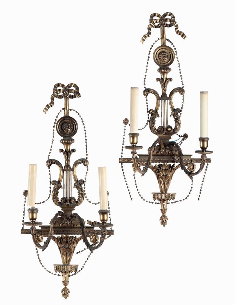Coppia di appliques a due luci in metallo dorato. XIX secolo  - Auction Italian Mansions - Cambi Casa d'Aste