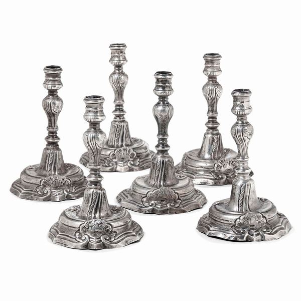 Gruppo di sei candelieri in argento fuso, sbalzato e cesellato. Palermo terzo quarto del XVIII secolo
