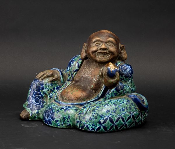 Figurina di Budai in porcellana Yixing parzialmente smaltata, Cina, Dinastia Qing, XIX secolo