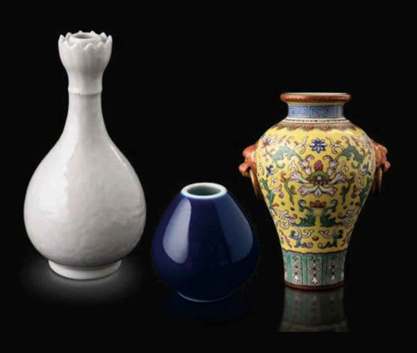 Two porcelain vases and a candle holder, China
