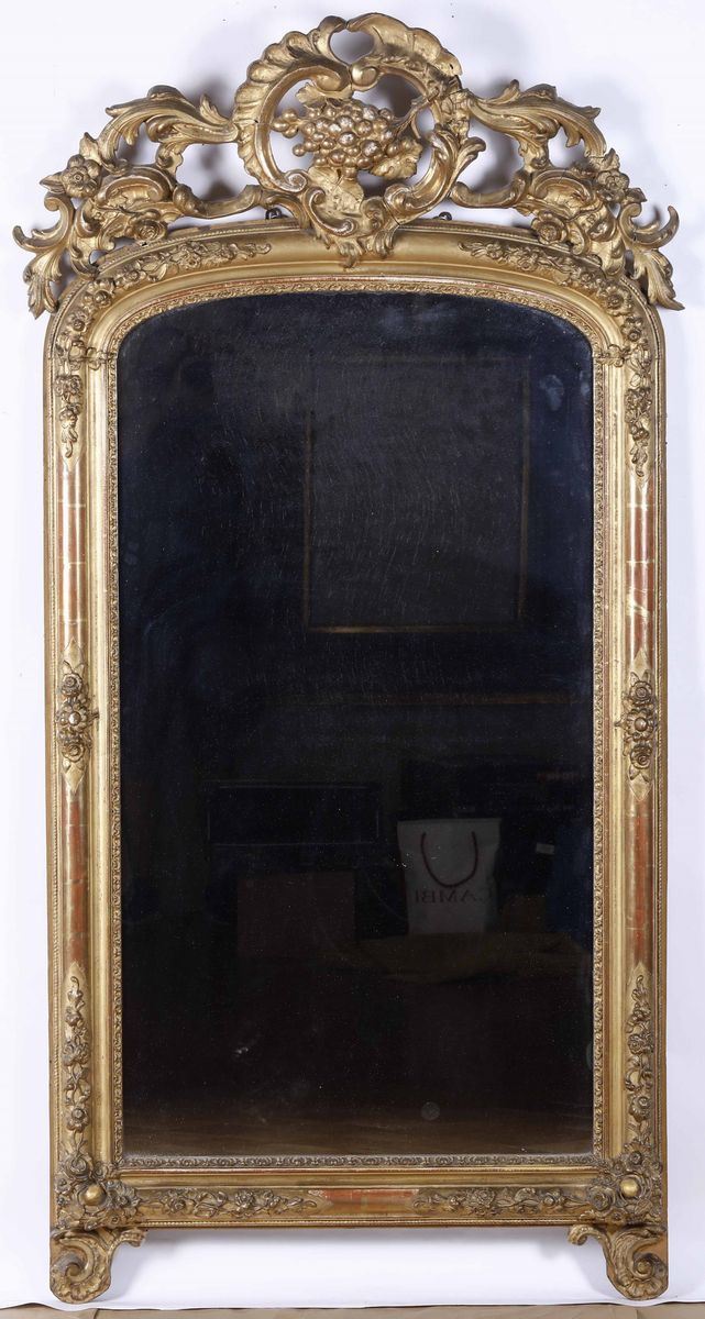 Grande specchiera intagliata e dorata. XX secolo  - Auction Antique October | Cambi Time - Cambi Casa d'Aste