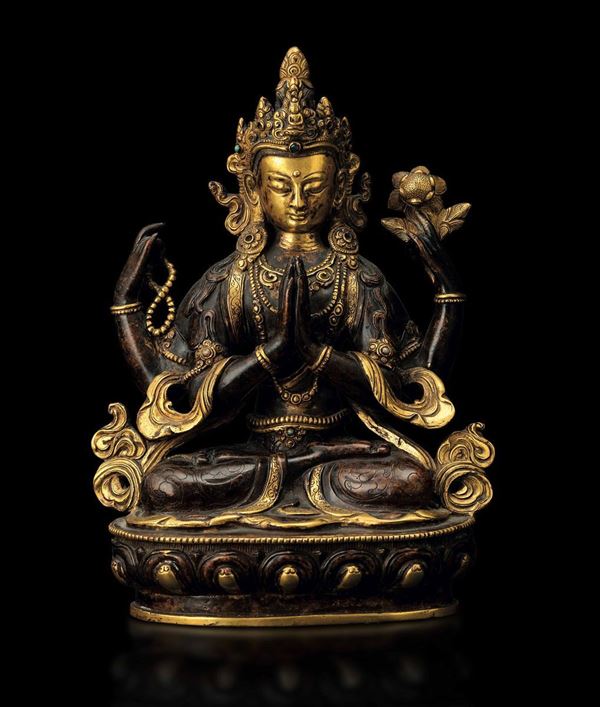 A partly gilt bronze Buddha, Tibet, 1800s