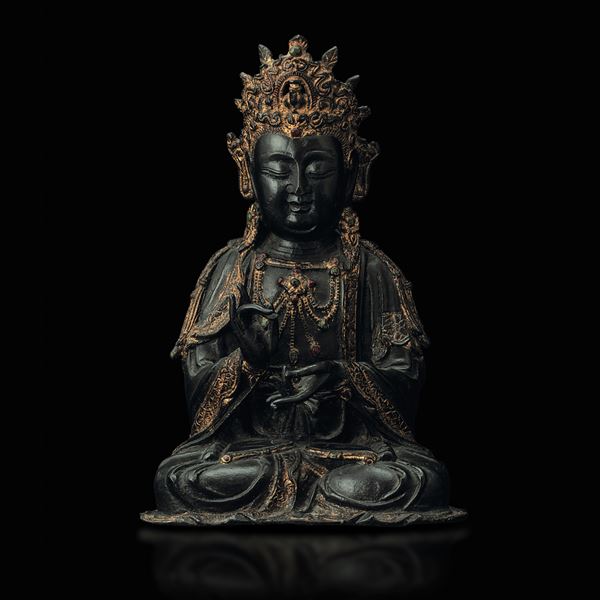 A partly gilt bronze Guanyin, China, Ming Dynasty