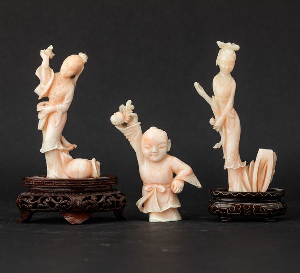 Three pink coral figures, China, early 1900s