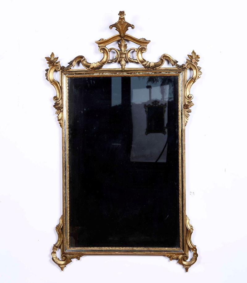 Specchiera in legno intagliato e dorato, XX secolo  - Auction Antique January - Cambi Casa d'Aste