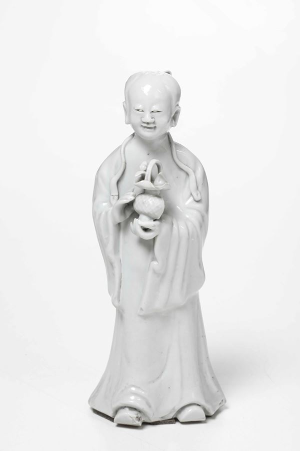 Figura di saggio con cesto in porcellana Blanc de Chine, Cina, Dinastia Qing, XIX secolo