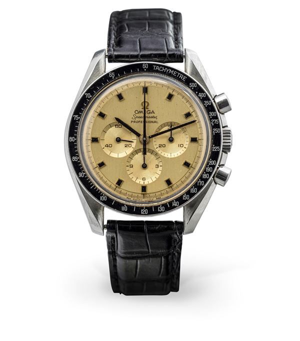 Omega - Speedmaster 145.022 hand-wound professional chronograph, three counters, steel case and gold dial with Onyx indexes