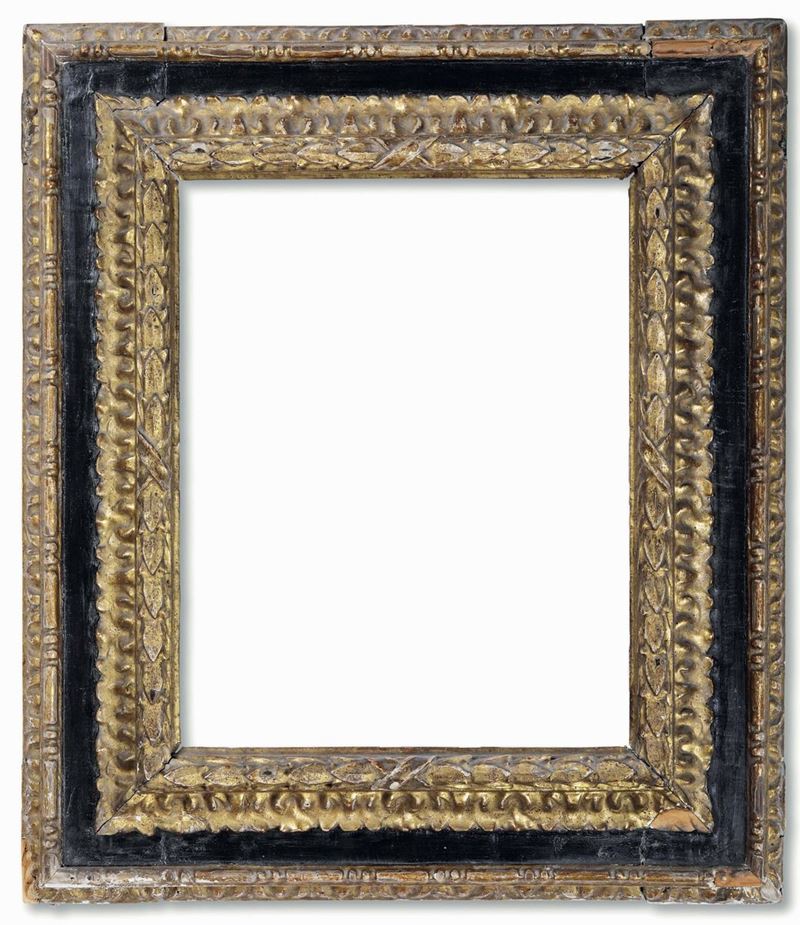 Cornice a cassetta nera e oro intagliata. Italia centrale XVII secolo  - Auction Frames - Cambi Casa d'Aste