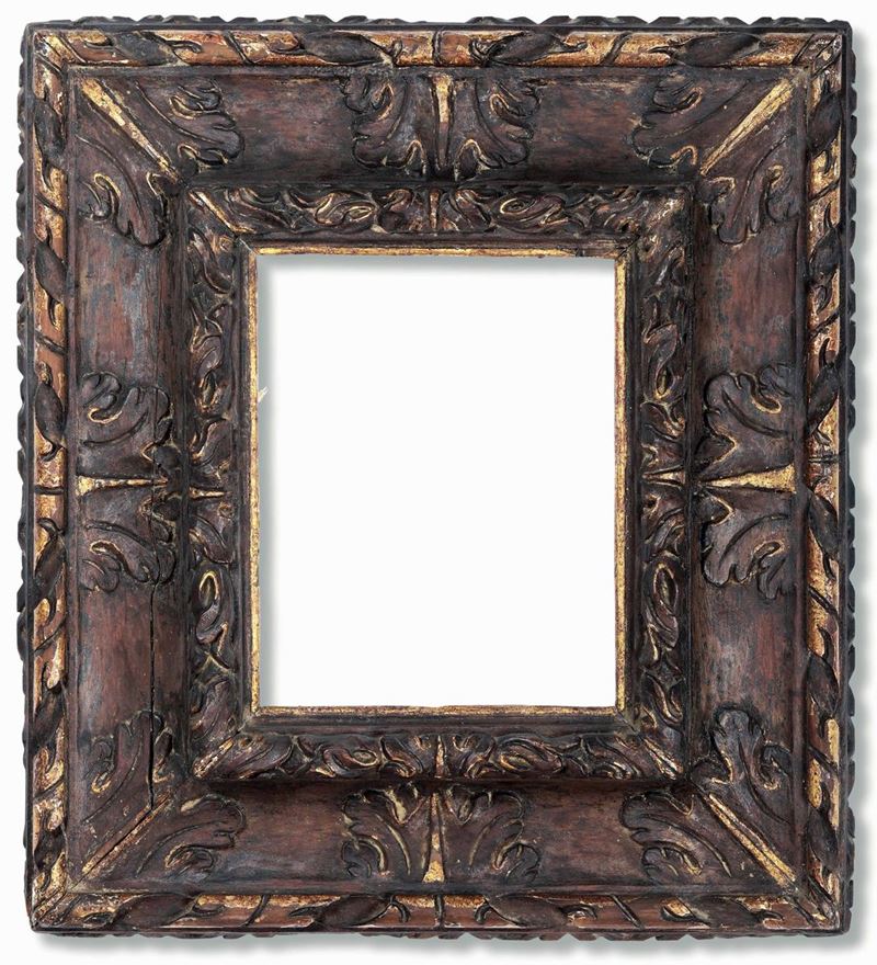 Cornice in legno intagliato con lumeggiature in oro, Italia XVII secolo  - Auction Frames - Cambi Casa d'Aste
