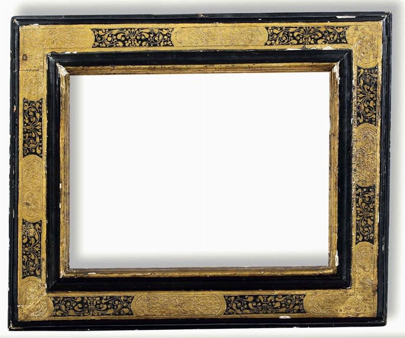 Cornice a cassetta in legno ebanizzato, dorato e bulinato. Toscana XVII secolo  - Auction Frames - Cambi Casa d'Aste