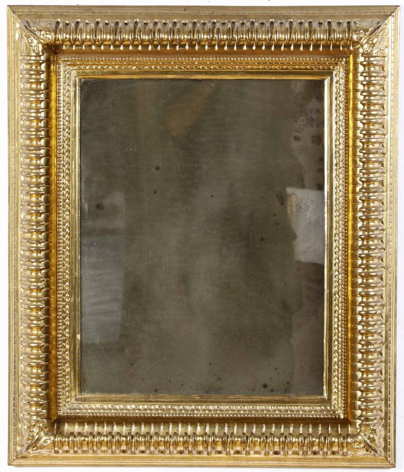 Cornice intagliata e dorata a sbaccellature  - Auction Frames - Cambi Casa d'Aste