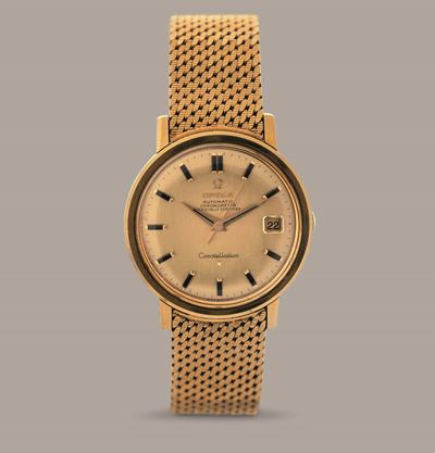 Omega - Costellation in Oro Giallo 18k, Quadrante Dorato con Indici in Onice e Datario, Bracciale...