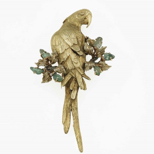 Gold and emerald brooch. Signed M. Buccellati