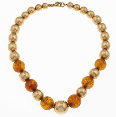 Collana con Ambra ed Inserti in Oro a Basso Titolo