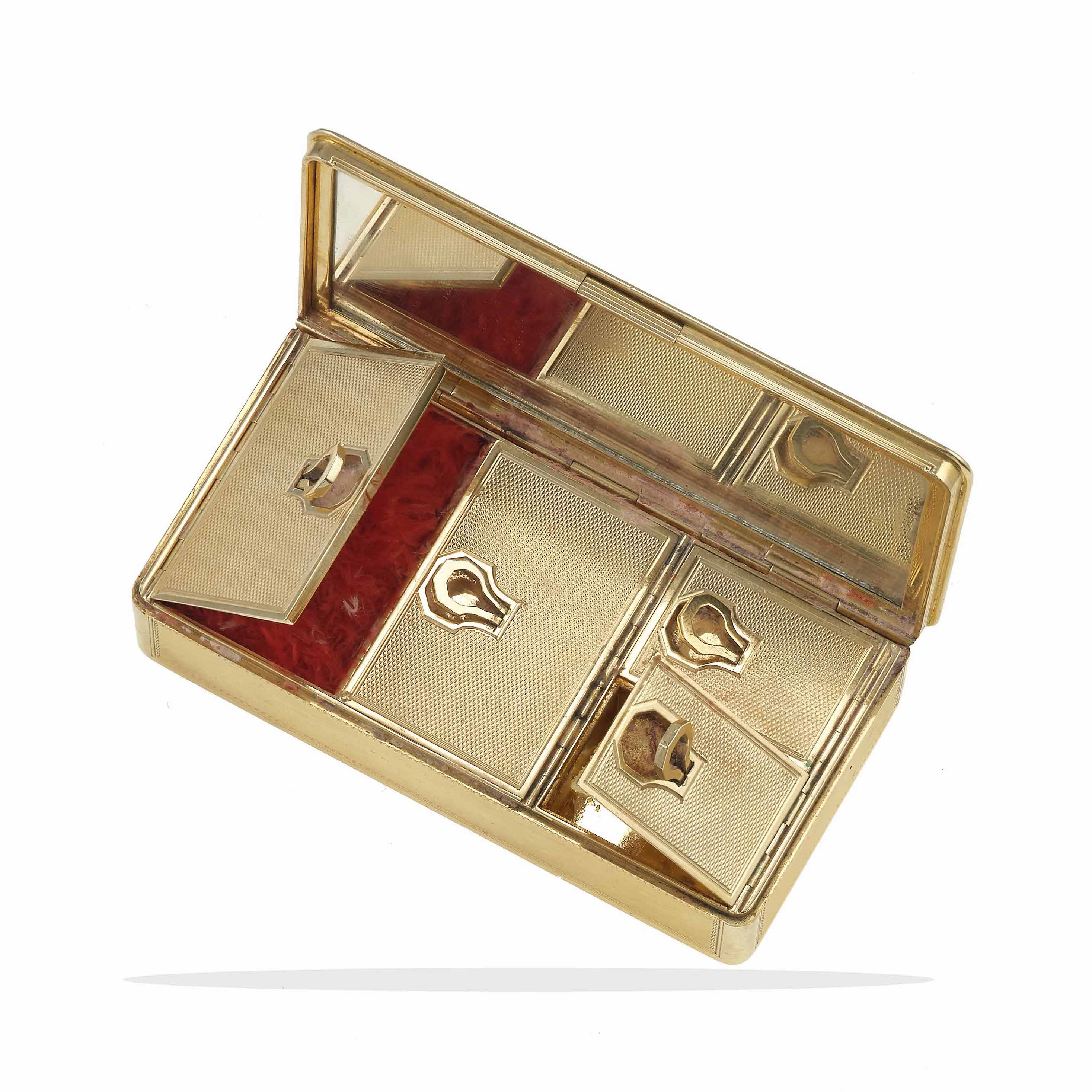 Trousse con inserto in diamanti, oro giallo 750/1000 e platino