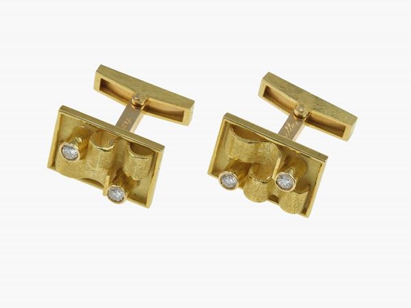 Pair of diamond and gold cufflinks. Signed Masenza, Roma