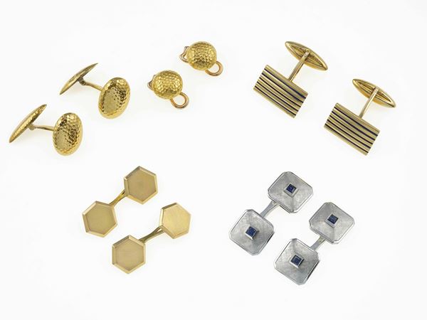 Four pairs of gold cufflinks and a pair of gold dress set