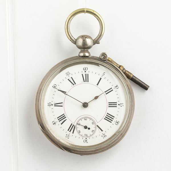 Orologio da tasca Fleury Geneve, 1870 circa.  Cassa in argento, quadrante in smalto bianco, movimento carica a chiavetta scappamento a cilindro.