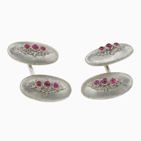 Pair of gold and ruby cufflinks. Signed Buccellati