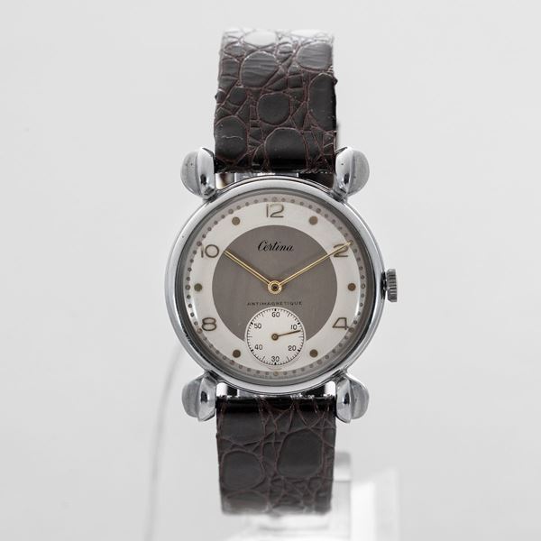 CERTINA - Inusuale  orologio con anse 'Fancy' solo tempo con secondi in basso, quadrante bitonale con numeri Arabi applicati