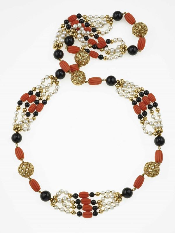 Gold, coral, onix and cultured pearl necklace. Signed Cartier, numbered 46653