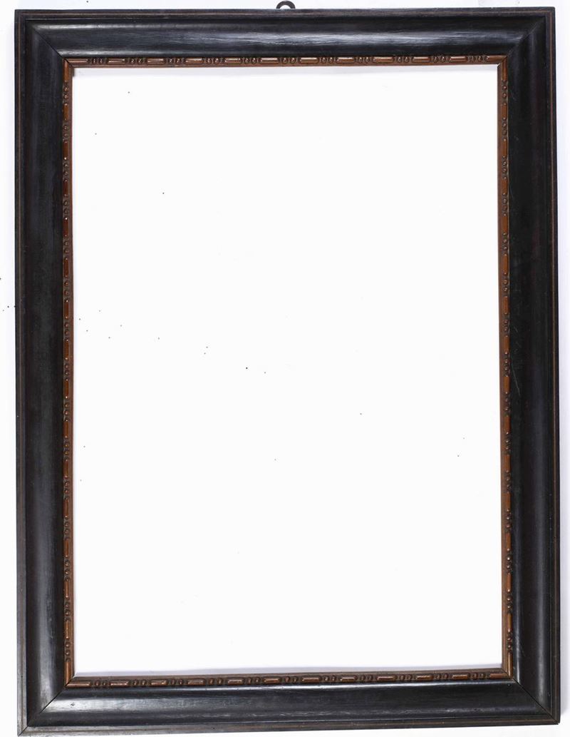 Cornice in legno intagliato ed ebanizzato. Italia centrale XVIII secolo  - Auction Frames - Cambi Casa d'Aste