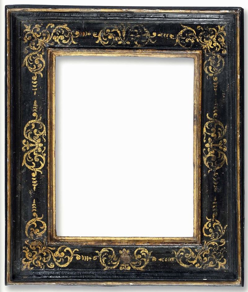 Cornice a cassetta in legno ebanizzato con decori dorati. Italia centrale XVII secolo  - Auction Frames - Cambi Casa d'Aste