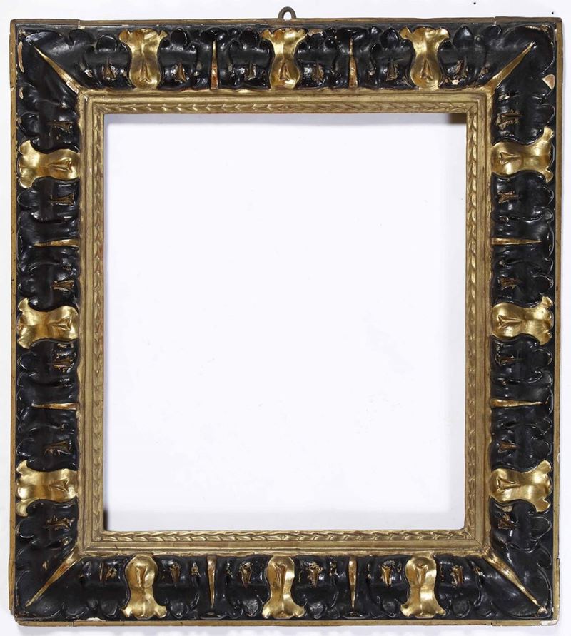 Cornice in legno modanato, intagliato, ebanizzato e dorato. Centro Italia XVII secolo  - Auction Frames - Cambi Casa d'Aste