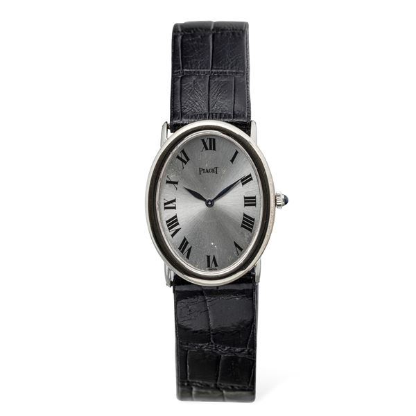 Elegant Ellipse watch in white gold, silver dial with Roman numerals, leaf hands, warranty and clutch  [..]
