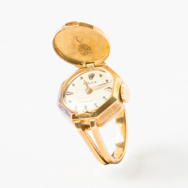 Rolex, anello con orologio, 1950 circa, carica manuale, in oro 18 kt, gr 8, da revisionare