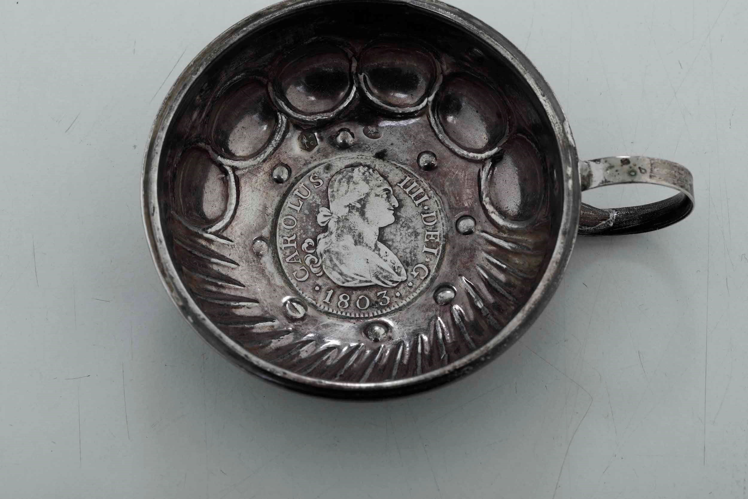 Quattro Tastevin. Argento Fuso e Sbalzato. Manifatture Diverse, XIX-XX Secolo