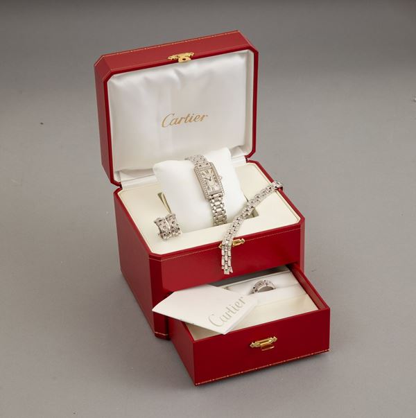 Cartier. Parure composta da anello, orecchini, bracciale ed orologio modello “Maillon Panthère”