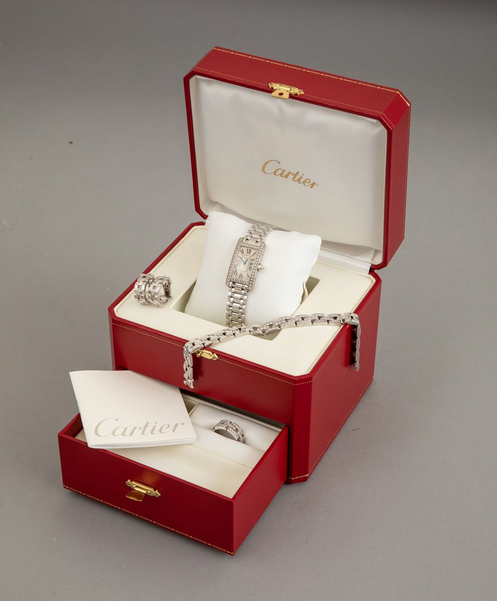Cartier. Parure Composta da Anello, Orecchini, Bracciale ed Orologio Modello “maillon Panthère”