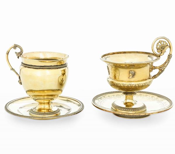 Due tazze con piatto. Argento primo titolo fuso, sbalzato, cesellato e dorato. Parigi marchi in uso dal 1798 al 1809. Marchio dell’argentiere non identificato