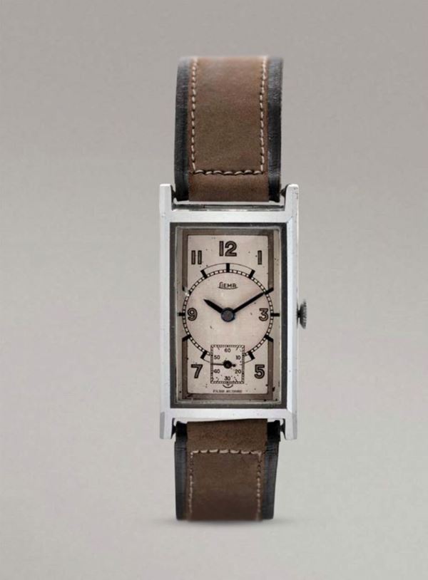 LIEMA - Elegante orologio di forma rettangolare quadrante tre toni con numeri Arabi, piccoli secondi al sei, cassa in metallo nichelato