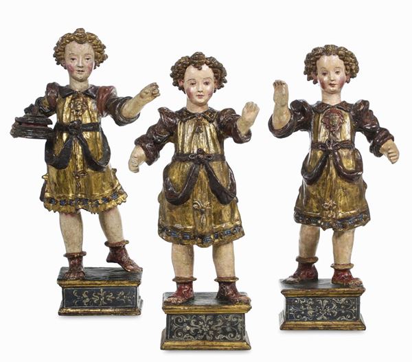 Tre angeli reggicero. Legno policromo e dorato. Arte rinascimentale umbro-senese del XVI secolo