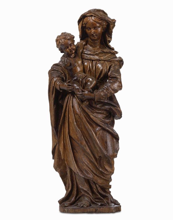 Madonna con Bambino. Legno scolpito (mancante della policromia). Scultore barocco genovese del XVII secolo prossimo a Domenico Parodi (Genova 1672 - 1742)
