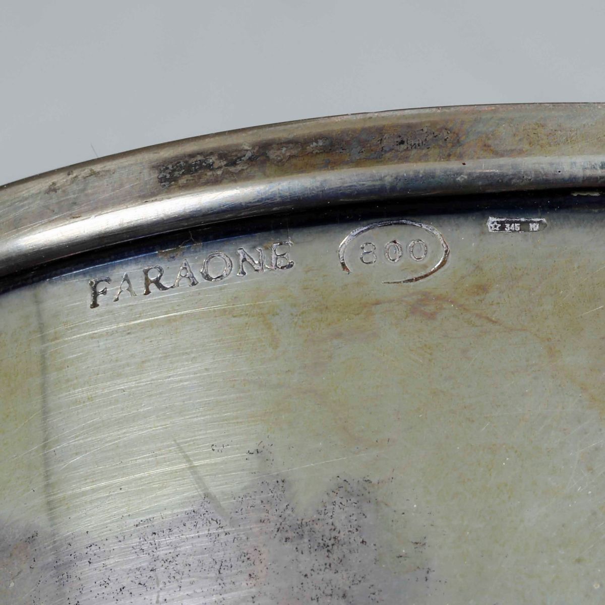 Piatto e Due Centrotavola in Argento Fuso. Diverse Manifatture Italiane del XX Secolo