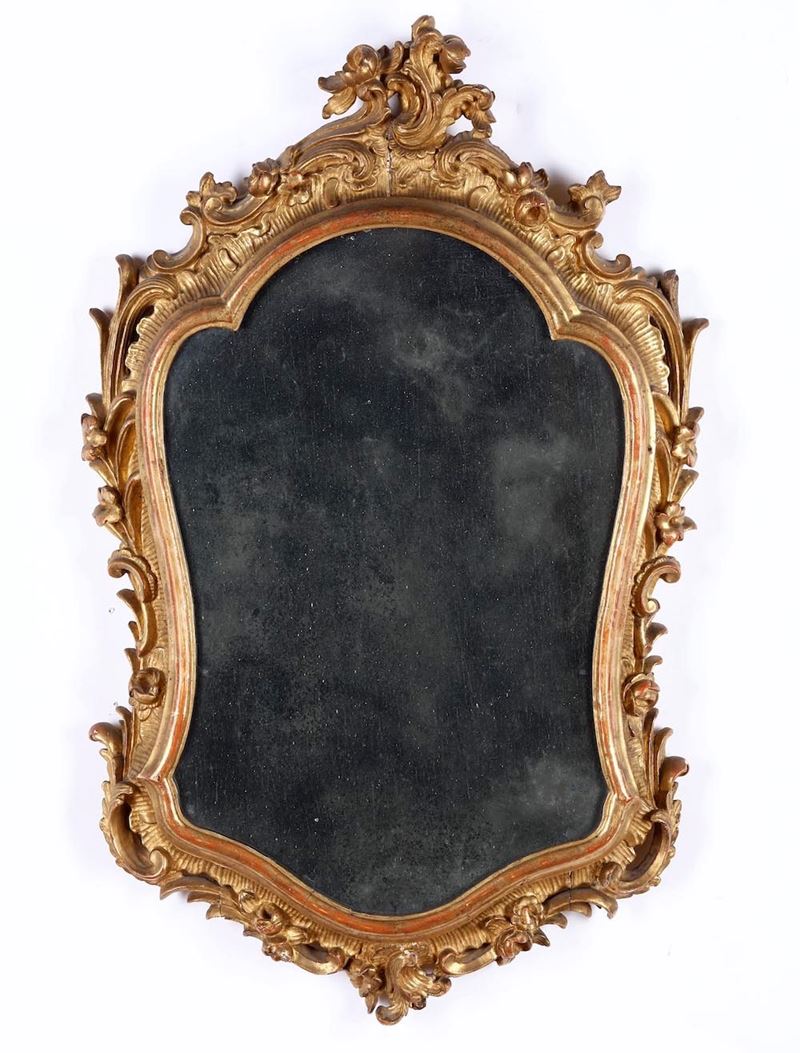 Specchiera in legno intagliato e dorato. XVIII-XIX secolo  - Asta Antiquariato Aprile - Cambi Casa d'Aste