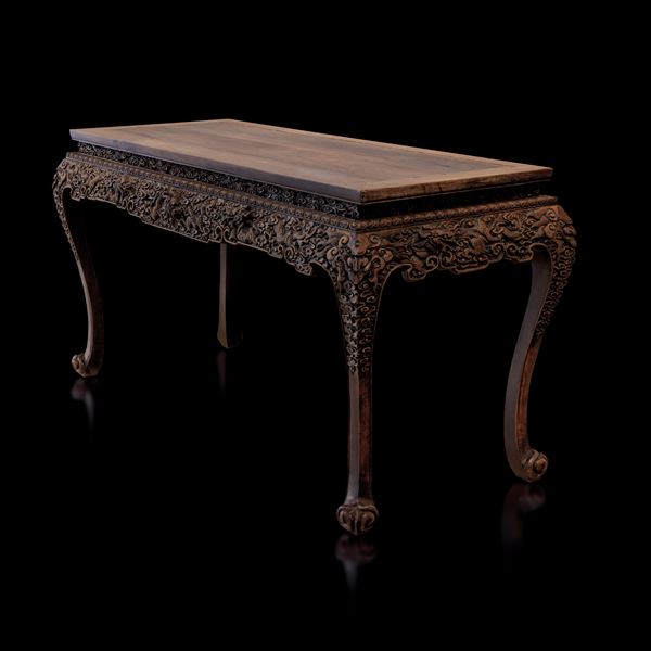A finely carved Huanghuali table, China, Qing Dynasty
