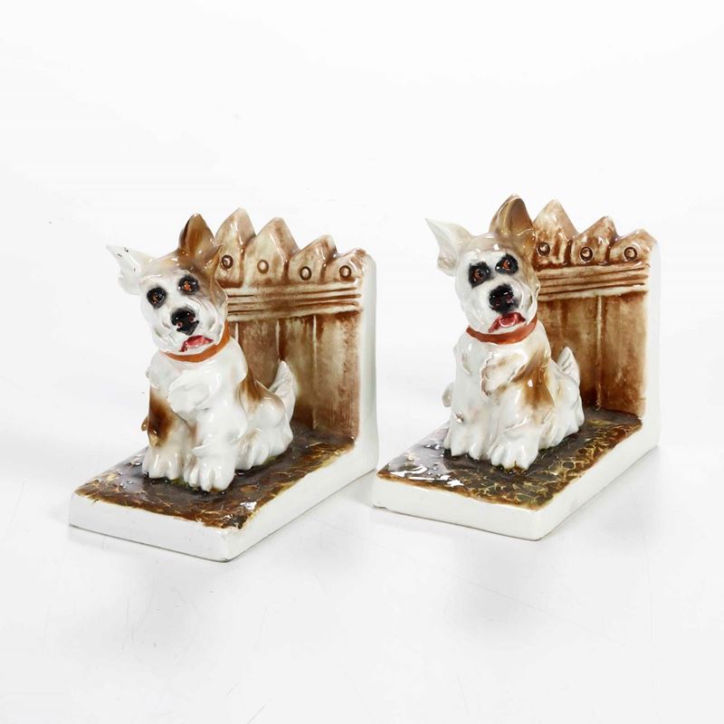 Coppia di reggilibri, XX secolo.  - Auction Majolica and Porcelain - Cambi Casa d'Aste